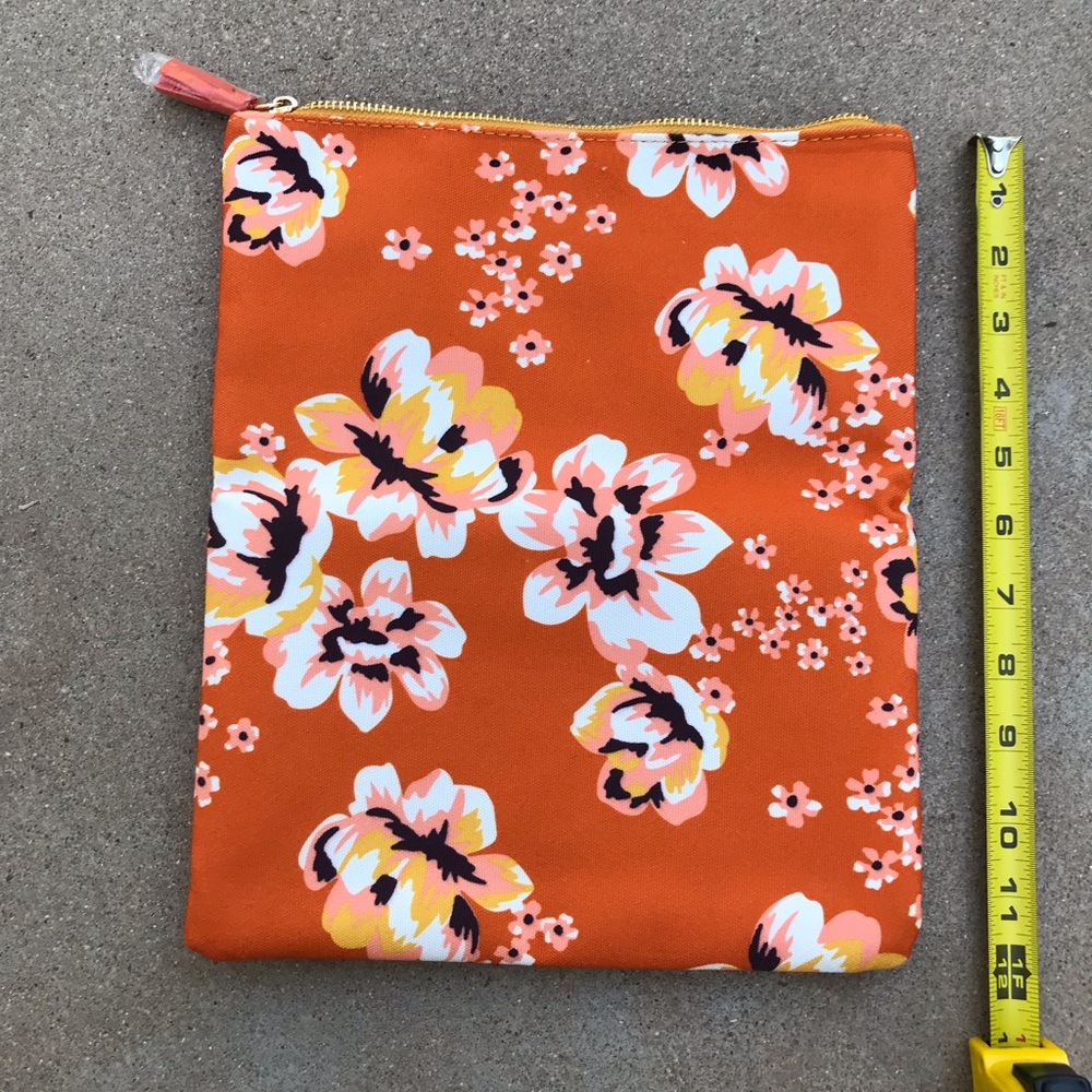 Rachel Pally orange and yellow floral fold over clutch